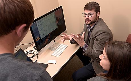 photo of Dr. Patrick Ledwidge with students